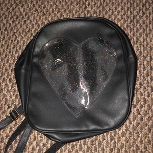 Heart shaped Ita bag for pin display.